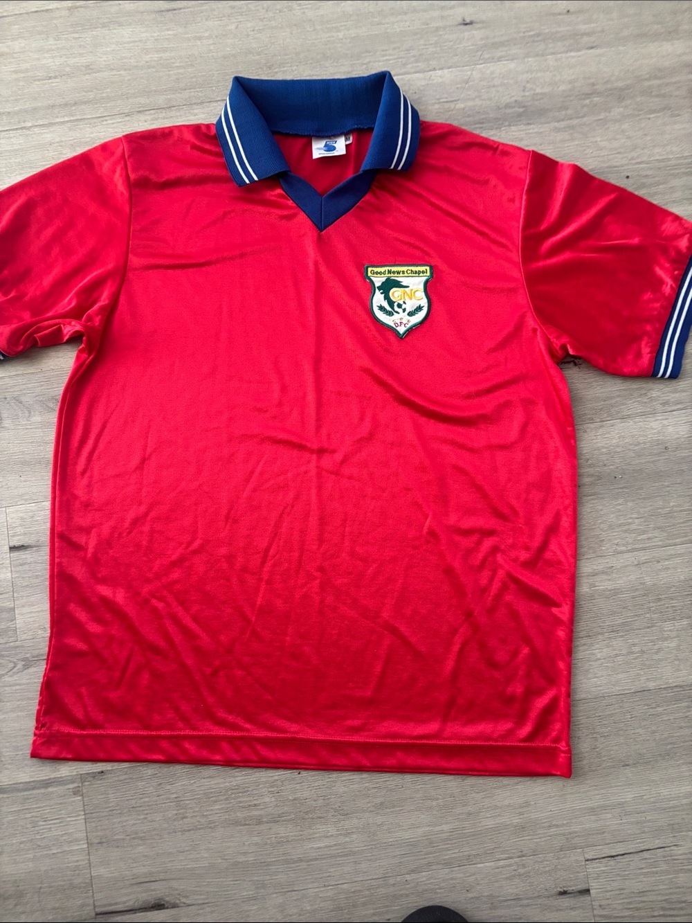 Good news Chapel Red Soccer Jersey with Navy Collar